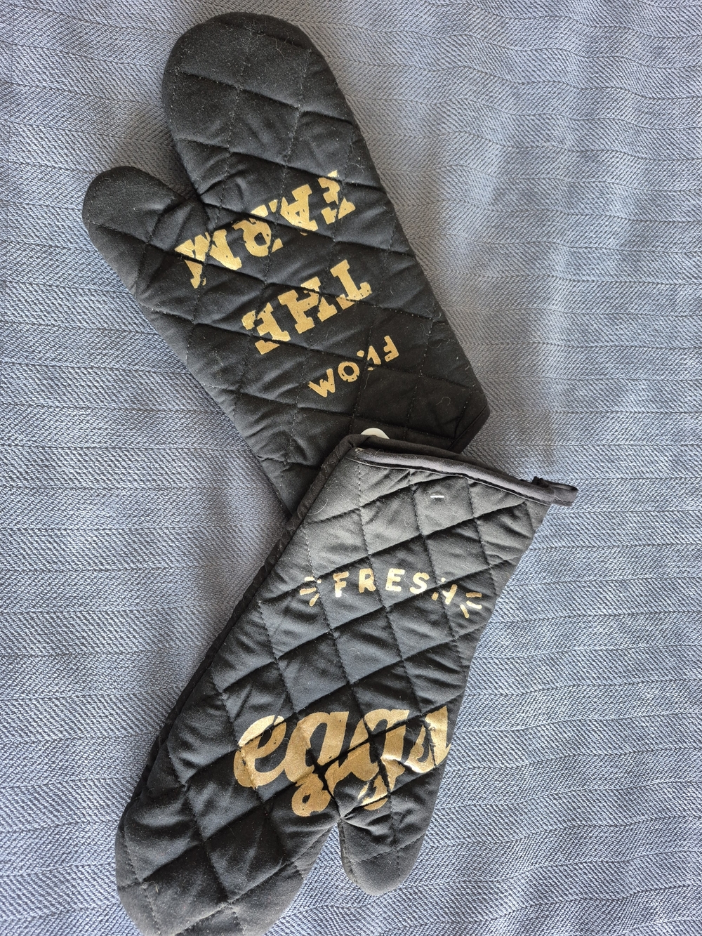 Black Quilted Oven Mitts with Gold Accent